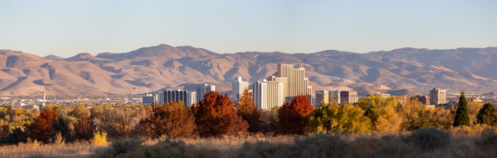 Reno Nevada cityscape and Mountains.