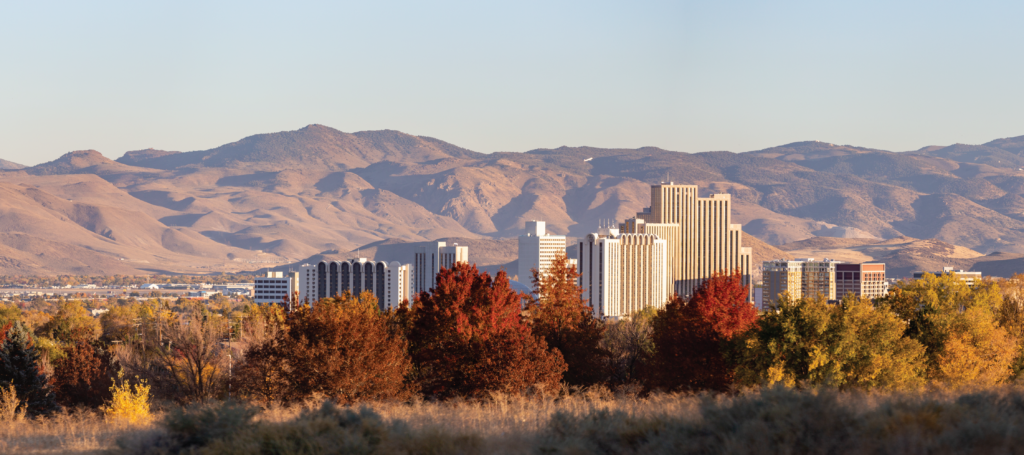 Reno Nevada cityscape and Mountains.